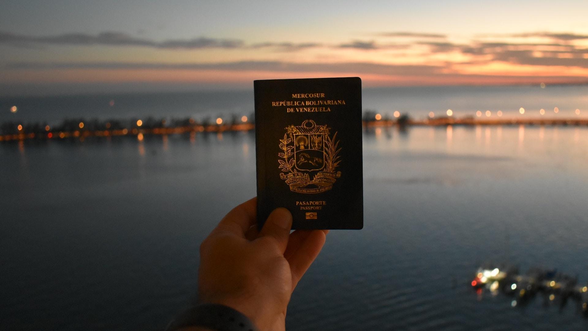 person holding venezuelan passport by Fernando Gago